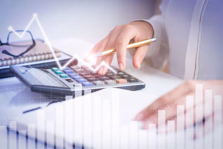 accountant-calculating-profit-with-financial-analysis-graphs_74855-4937.jpg